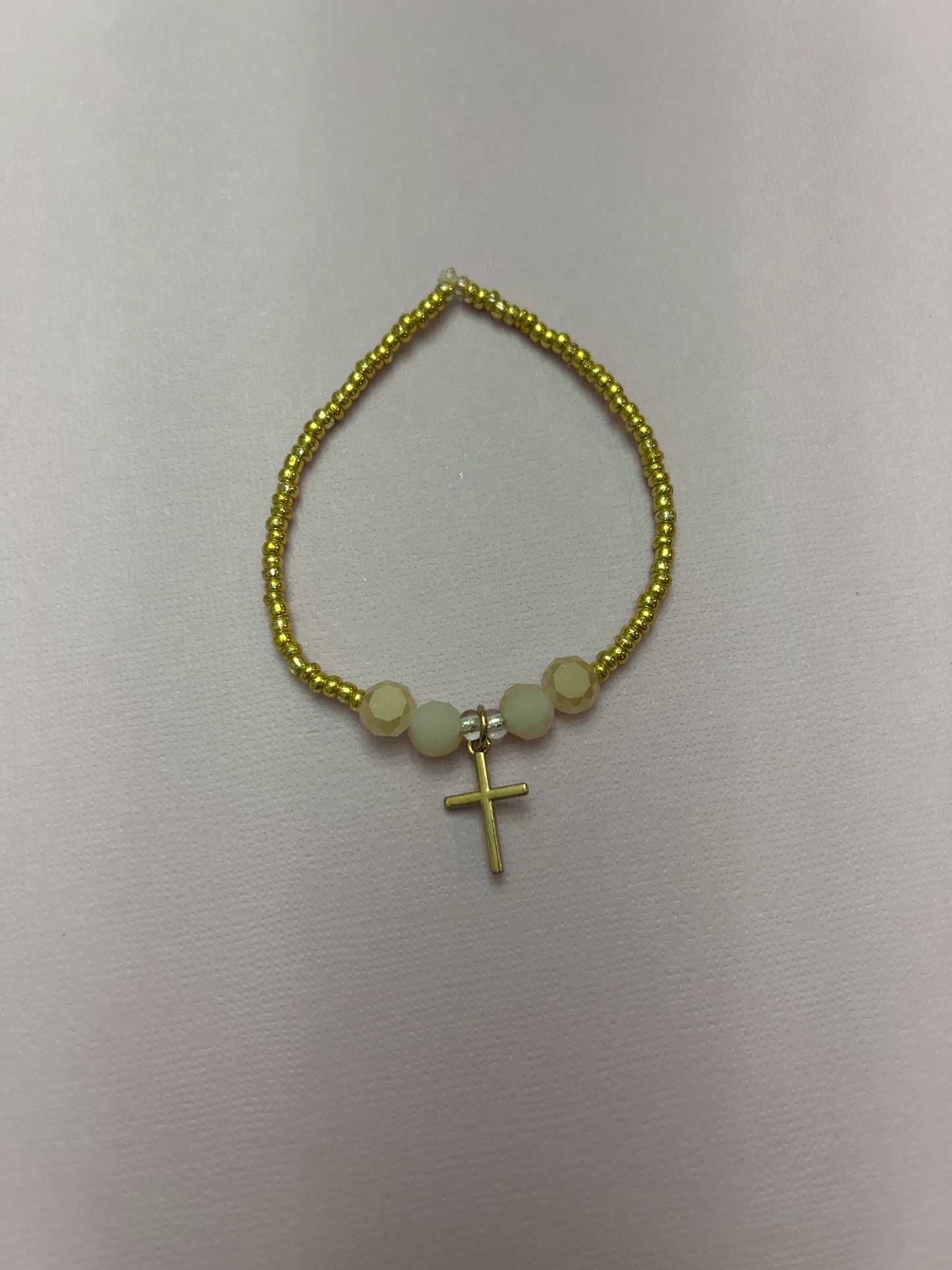 Gold cross bracelet