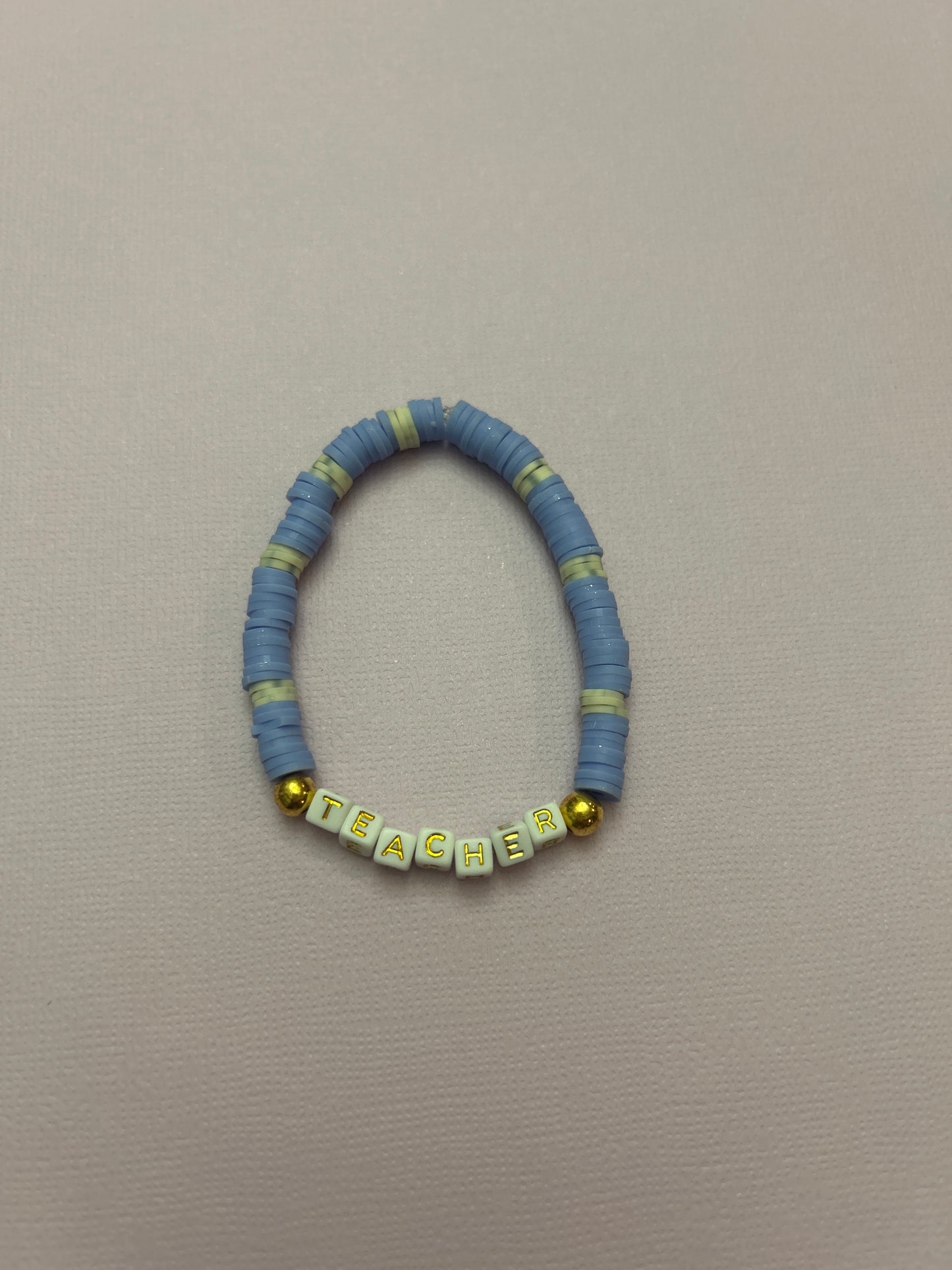 “Teacher” clay bead bracelet